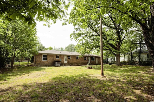 301 Riley St, Hot Springs, AR 71901 - view of yard with central AC, entry steps, and fence