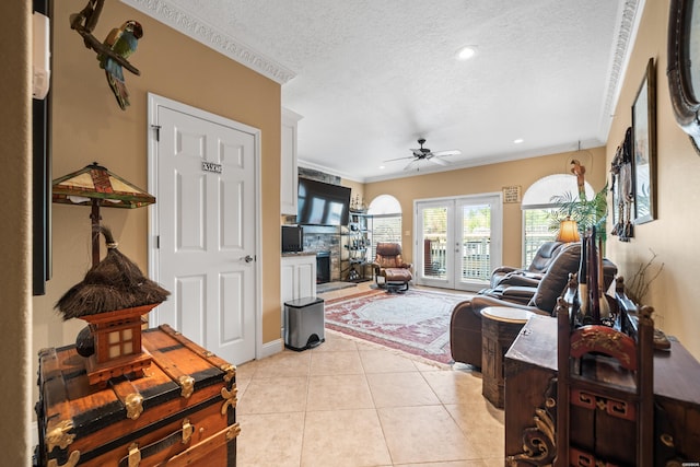 1380 Airport Rd Unit E-1, Hot Springs, AR 71913 - living area featuring a textured ceiling, ceiling fan, light tile patterned flooring, french doors, and recessed lighting