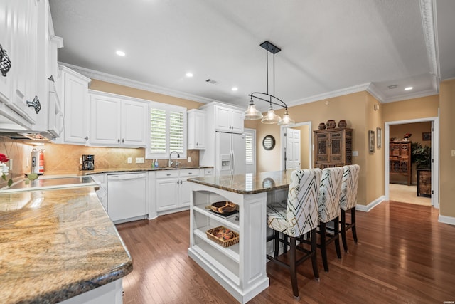 1380 Airport Rd Unit E-1, Hot Springs, AR 71913 - kitchen featuring white appliances, open shelves, a kitchen island, a kitchen bar, and crown molding