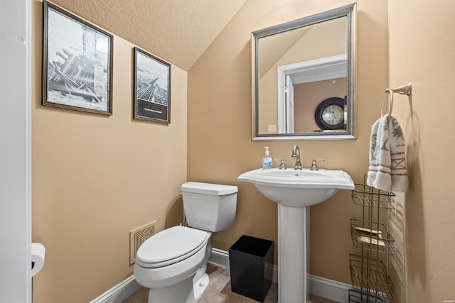 1380 Airport Rd Unit E-1, Hot Springs, AR 71913 - bathroom with toilet and lofted ceiling