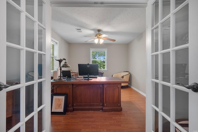 103 Deer View Ct, Hot Springs, AR 71913 - office featuring french doors, wood finished floors, ceiling fan, a textured ceiling, and baseboards