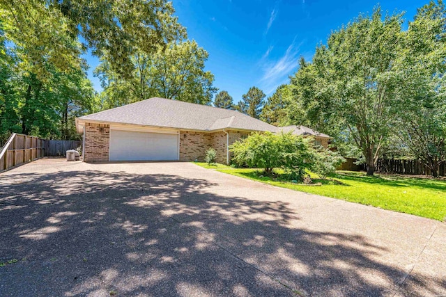 103 Deer View Ct, Hot Springs, AR 71913 - ranch-style house with brick siding, an attached garage, and concrete driveway