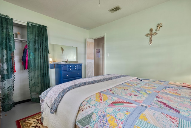 102 Avalon Dr, Pearcy, AR 71964 - bedroom with concrete floors and a closet