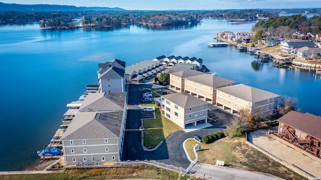 birds eye view of property with a residential view and a water view