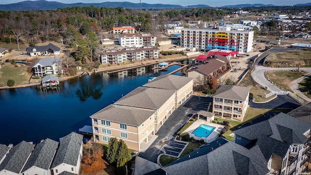 aerial view featuring a water and mountain view