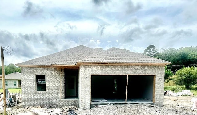 105 Wickford Trl, Hot Springs, AR 71913 - view of front of property with brick siding, a garage, and a shingled roof