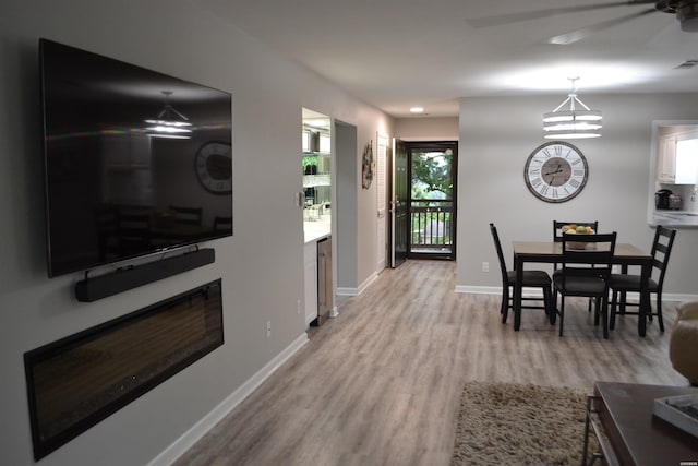 200 Hamilton Oaks Dr Unit J3, Hot Springs, AR 71913 - living room featuring light wood-style flooring, baseboards, and ceiling fan