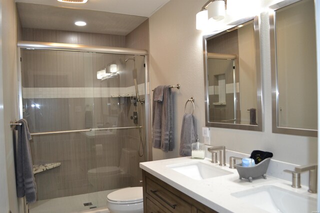 200 Hamilton Oaks Dr Unit J3, Hot Springs, AR 71913 - full bathroom featuring toilet, a stall shower, and double vanity