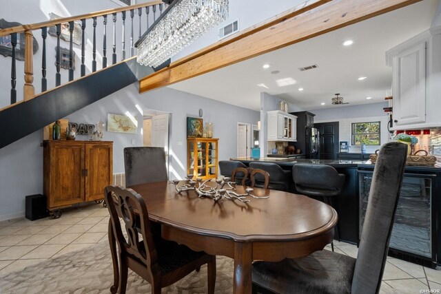 dining area with light tile patterned floors, stairs, visible vents, and recessed lighting