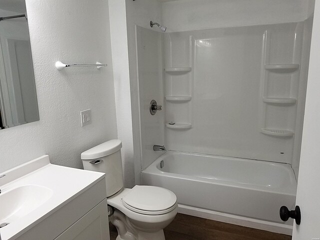 186 Vanadium Cir, Hot Springs, AR 71901 - bathroom with wood finished floors, toilet, a textured wall, vanity, and tub / shower combination