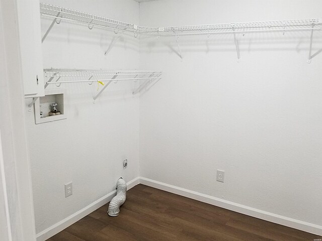 186 Vanadium Cir, Hot Springs, AR 71901 - washroom featuring hookup for an electric dryer, dark wood-style flooring, washer hookup, laundry area, and baseboards