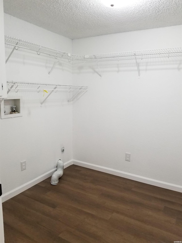 186 Vanadium Cir, Hot Springs, AR 71901 - washroom featuring hookup for an electric dryer, laundry area, hookup for a washing machine, baseboards, and wood finished floors