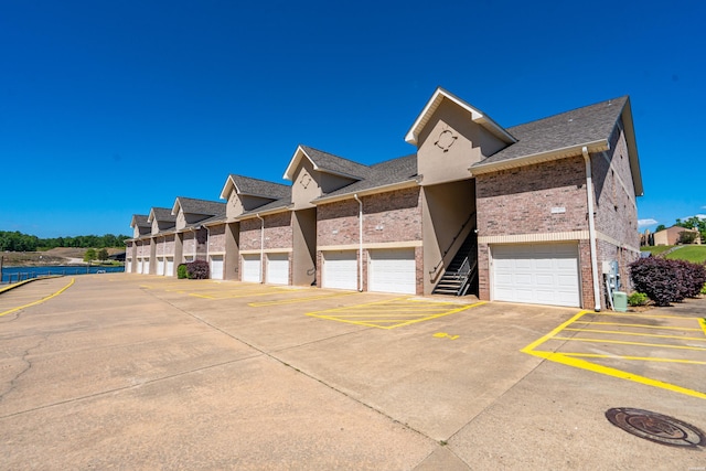 532 Grand Point Dr Unit B3, Hot Springs, AR 71901 - view of front of property with brick siding and roof with shingles