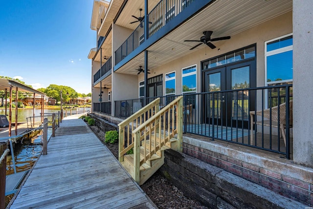 532 Grand Point Dr Unit B3, Hot Springs, AR 71901 - wooden terrace with a ceiling fan, a dock, and french doors