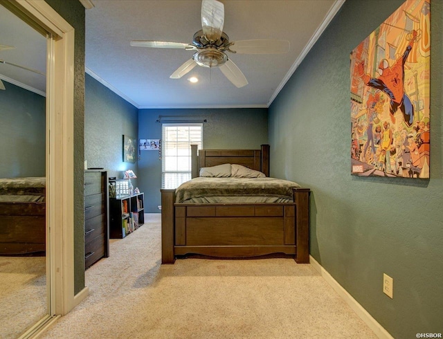 bedroom featuring a textured wall, light carpet, crown molding, and baseboards