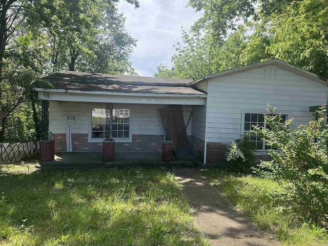 244 Silver St, Hot Springs, AR 71901 - bungalow-style house with brick siding, a porch, and a shingled roof