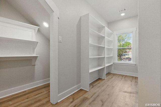 132 Lombard Ct, Hot Springs, AR 71901 - spacious closet with visible vents, wood finished floors, and lofted ceiling