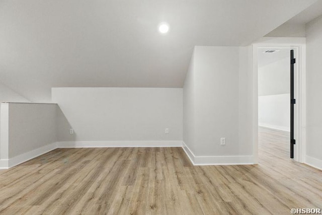132 Lombard Ct, Hot Springs, AR 71901 - additional living space with wood finished floors, baseboards, and vaulted ceiling