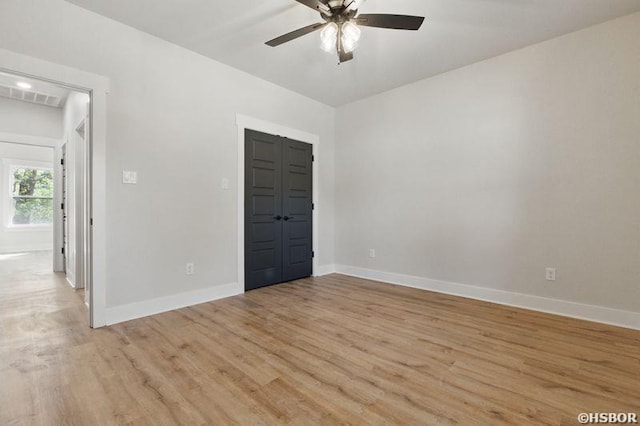 132 Lombard Ct, Hot Springs, AR 71901 - empty room with visible vents, ceiling fan, light wood finished floors, and baseboards