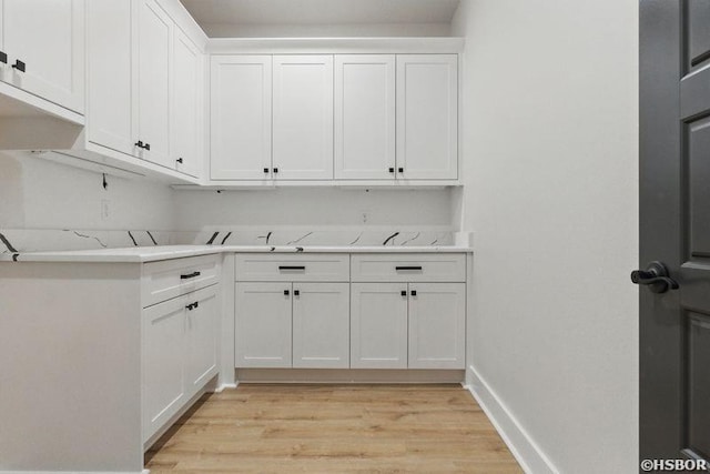 132 Lombard Ct, Hot Springs, AR 71901 - laundry area featuring baseboards and light wood finished floors