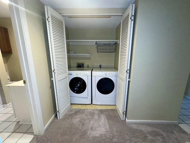 142 Lake Hamilton Dr Unit 410, Hot Springs, AR 71913 - clothes washing area with separate washer and dryer, baseboards, laundry area, and light carpet