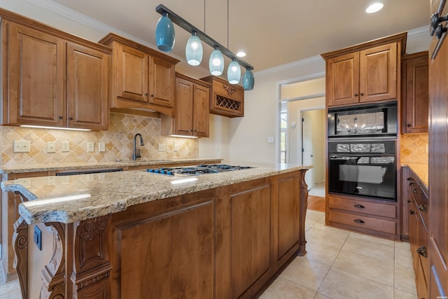 kitchen with brown cabinets, black appliances, ornamental molding, light tile patterned floors, and light stone countertops