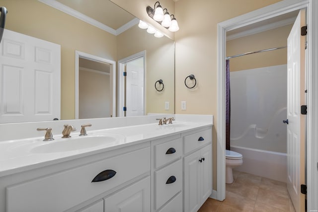 full bath featuring tile patterned flooring, crown molding, toilet, double vanity, and a sink