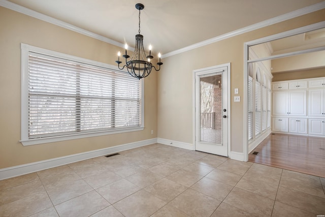 unfurnished room with visible vents, baseboards, ornamental molding, light tile patterned floors, and a notable chandelier