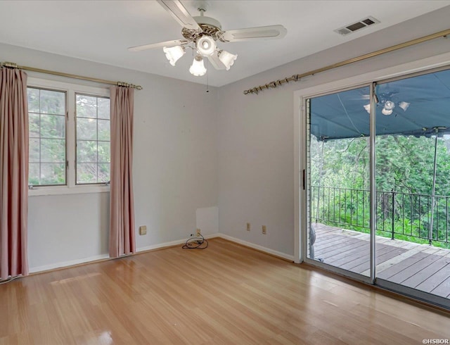 509 Belvedere Dr Unit B4, Hot Springs, AR 71901 - spare room featuring light wood-style flooring, baseboards, and ceiling fan