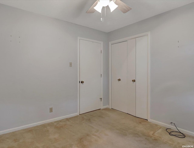 509 Belvedere Dr Unit B4, Hot Springs, AR 71901 - unfurnished bedroom with light carpet, baseboards, a closet, and ceiling fan