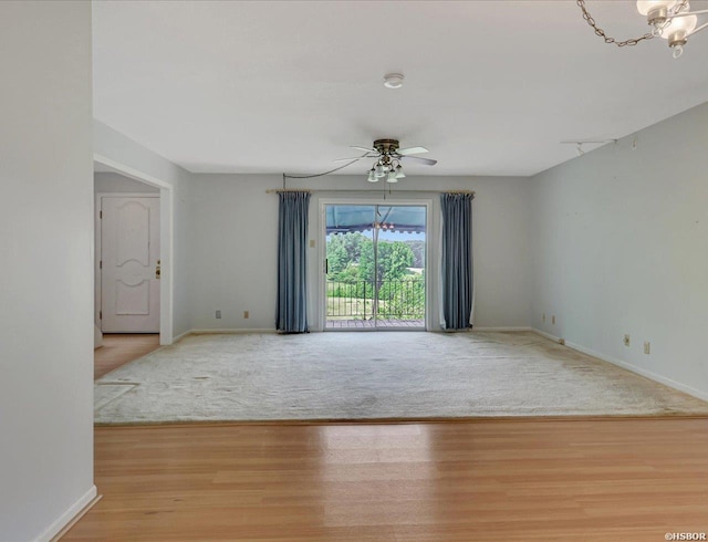509 Belvedere Dr Unit B4, Hot Springs, AR 71901 - empty room featuring a ceiling fan, baseboards, wood finished floors, and carpet flooring