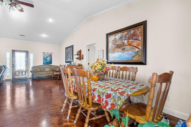 dining room featuring crown molding, visible vents, vaulted ceiling, and baseboards