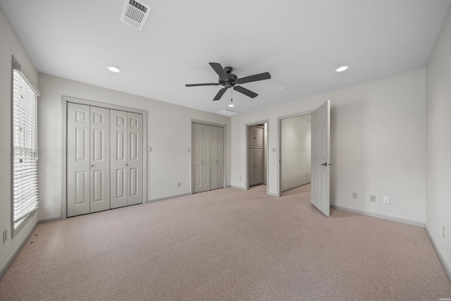 unfurnished bedroom featuring recessed lighting, visible vents, and baseboards