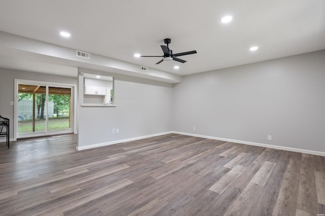 401 Buttrum Rd, Royal, AR 71968 - unfurnished room with a ceiling fan, recessed lighting, and wood finished floors