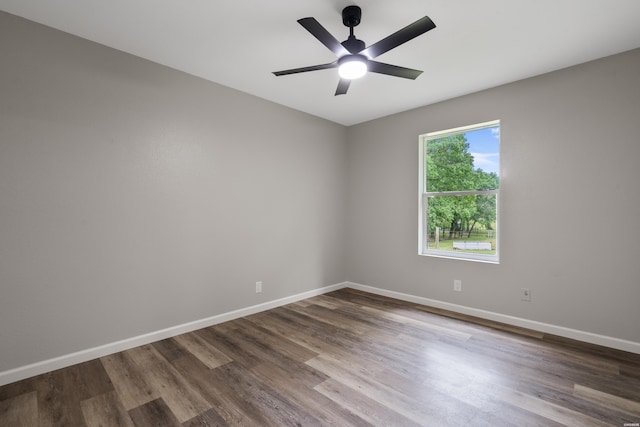 401 Buttrum Rd, Royal, AR 71968 - unfurnished room with dark wood-style flooring and a ceiling fan