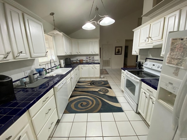 kitchen with pendant lighting, light tile patterned floors, white cabinetry, a sink, and white appliances