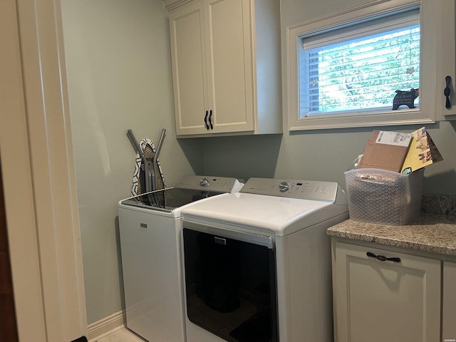 1910 Josh Dr, Conway, AR 72034 - laundry area with cabinet space and washer and clothes dryer