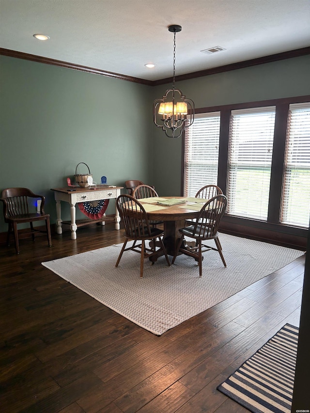 1910 Josh Dr, Conway, AR 72034 - dining area with healthy amount of natural light, a chandelier, ornamental molding, hardwood / wood-style floors, and recessed lighting