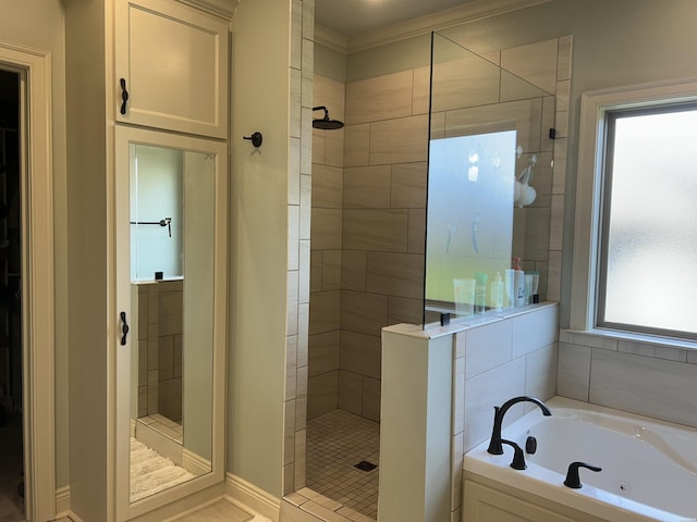 1910 Josh Dr, Conway, AR 72034 - bathroom with a tile shower, a jetted tub, and ornamental molding