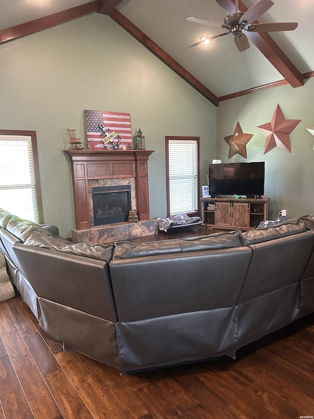1910 Josh Dr, Conway, AR 72034 - living area with dark wood finished floors, ceiling fan, and a fireplace