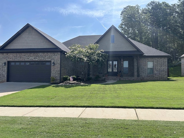 1910 Josh Dr, Conway, AR 72034 - craftsman-style home featuring french doors, brick siding, driveway, a front lawn, and a garage