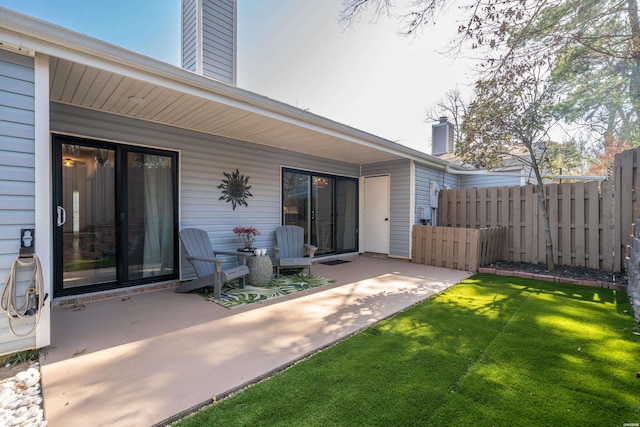 view of patio with fence