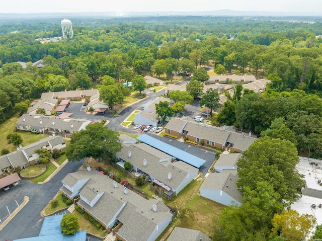 bird's eye view with a residential view and a view of trees