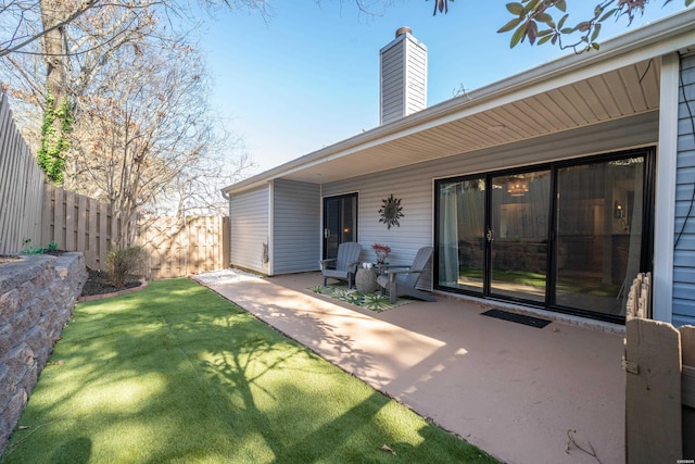 exterior space featuring a patio area and fence