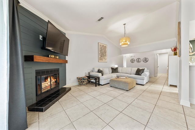 living area featuring lofted ceiling, light tile patterned flooring, a fireplace, and visible vents