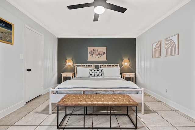 bedroom with light tile patterned floors, baseboards, and ornamental molding