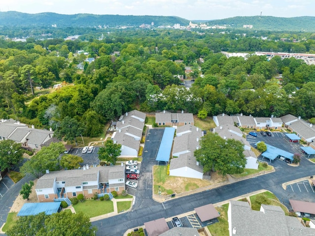 birds eye view of property featuring a mountain view and a residential view