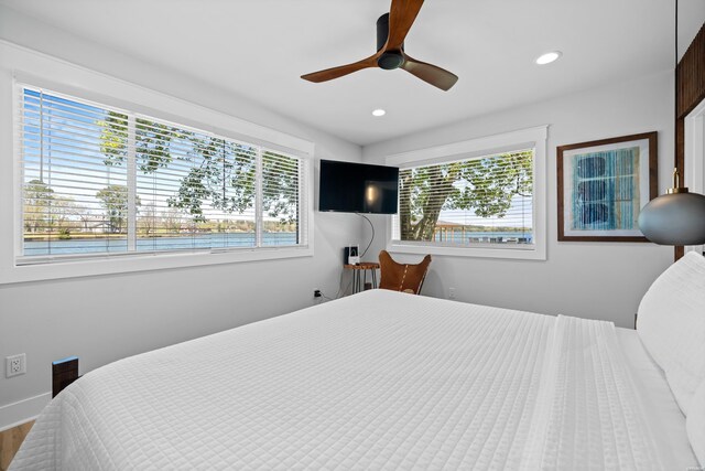 bedroom with ceiling fan, multiple windows, baseboards, and recessed lighting