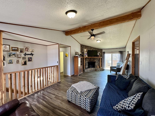 living room with a stone fireplace, lofted ceiling with beams, wood finished floors, and a textured ceiling