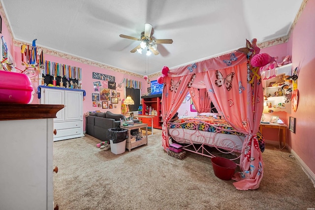 carpeted bedroom with a textured ceiling and ceiling fan
